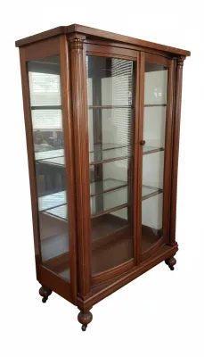 Sale Photo Thumbnail #14: Traditional wooden display cabinet with glass front and side panels, fluted side columns, and interior glass shelves.