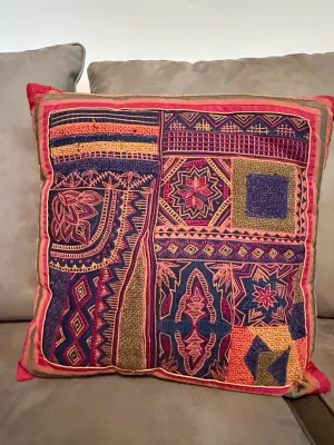 Sale Photo Thumbnail #227: Square throw pillow featuring vibrant, multi-patterned Bohemian-style embroidery with geometric and floral motifs.