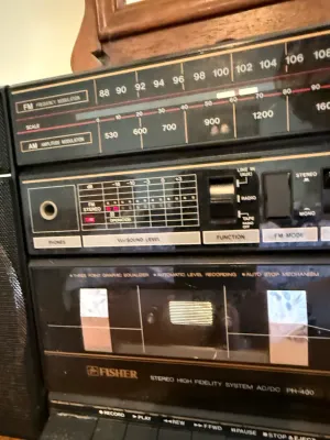 Sale Photo Thumbnail #348: Vintage Fisher PH-400 portable stereo boombox featuring an AM/FM radio tuner, cassette deck, and sound level meter.