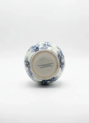 Sale Photo Thumbnail #25: Bottom view of a blue and white ceramic vessel stamped 'FOR DECORATIVE PURPOSES ONLY / NOT FOR FOOD USE'.