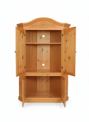 Sale Photo Thumbnail #3: Knotty pine corner entertainment armoire featuring an arched crown with carved shell motif, upper media cabinet with cable access, and lower storage cupboard.