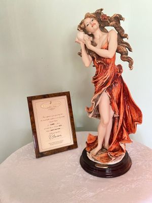Giuseppe Armani limited-edition figurine 'Sea Song' (Model 863/C), depicting a woman holding a conch shell, accompanied by...