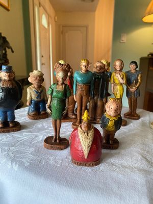 Collection of vintageSyroco carved wood-appearance resin comic strip character figurines, including The Little King, Maggie, Barney...