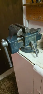 Sale Photo Thumbnail #22: Vintage heavy-duty bench vise with swivel base, stamped "3 1/2" and "MADE IN U.S.A."
