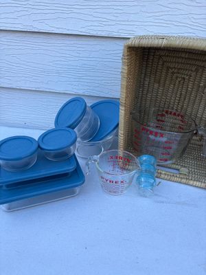 Sale Photo Thumbnail #221: Covered Pyrex bowls, and measuring cups with basket