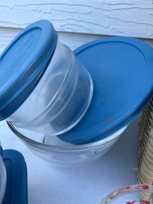 Sale Photo Thumbnail #223: Covered Pyrex bowls, and measuring cups with basket