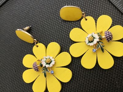 Sale Photo Thumbnail #185: Pair of bold yellow statement drop earrings featuring daisy-style flower shapes decorated with central enamelled floral, mushroom, and rhinestone accents. Fitted with post backs. Measure approximately 2.5 inches long. Excellent pre-owned condition with no