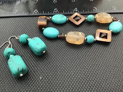 Sale Photo Thumbnail #21: A beaded costume jewelry set including a stretch bracelet and a pair of matching dangle/drop earrings. Features turquoise-colored composite beads, tiger's eye, jasper-like natural stones, and faceted glass accent beads. Earrings feature silver-tone fishho