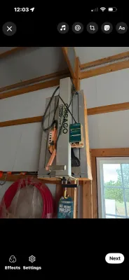 Sale Photo Thumbnail #17: Chicago Electric Power Tools wall-mounted overhead hoist or winch system, mounted in a workshop or garage setting.