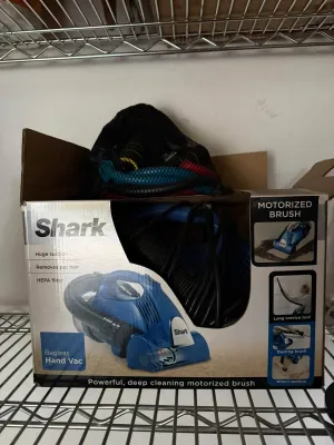 Sale Photo Thumbnail #16: Shark bagless hand vacuum in its original box with accessories.