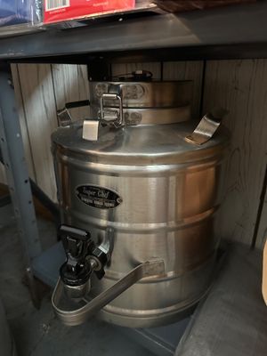 Sale Photo Thumbnail #59: Vintage Super Chef stainless steel insulated beverage dispenser with a front spigot and top locking lid.