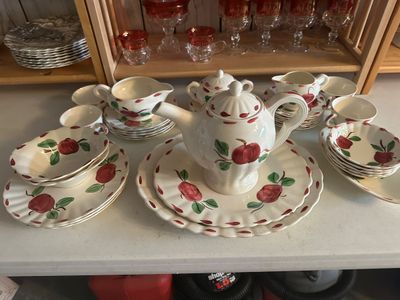 Sale Photo Thumbnail #40: Franciscan Apple pattern ceramic dishware set, including a teapot, creamers, sugar bowl, plates, and teacups.