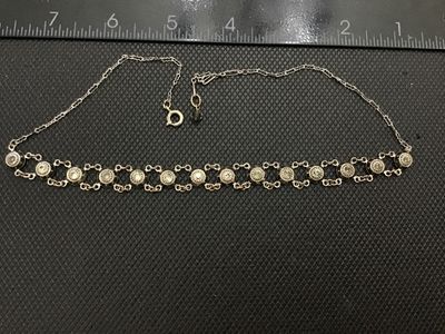 Sale Photo Thumbnail #71: Vintage Art Deco style choker necklace featuring linked circular stations set with bezel-set rhinestones or crystal accents, detailed textured backs, and a spring ring clasp with a faceted bead extension charm. Measures approximately 14-16 inches long. Sh