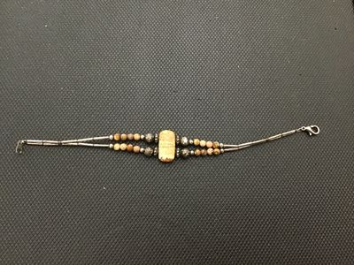 Sale Photo Thumbnail #171: Double-strand beaded bracelet featuring a rectangular picture jasper center stone, round picture jasper beads, decorative metallic accent beads, liquid silver-style tube beads, and a lobster claw clasp. Good pre-owned condition with light surface wear.