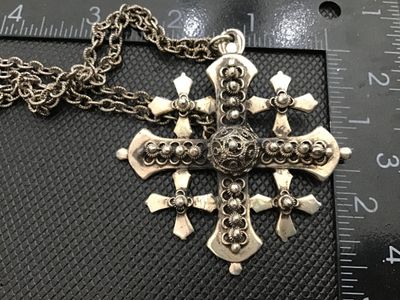 Sale Photo Thumbnail #36: Ornate silver-tone Jerusalem cross pendant necklace featuring intricate filigree work and beaded embellishments. The pendant measures approximately 2.5 inches by 2.5 inches and comes attached to a heavy textured link chain with a spring ring clasp. The re