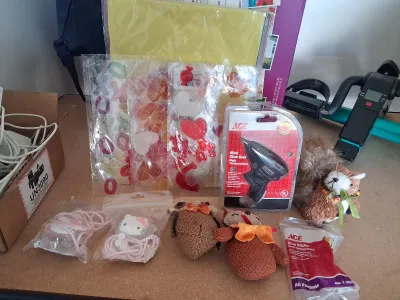 Sale Photo Thumbnail #183: BALLOON TIME HELIUM TANK, ACE MINI GLUE GUN, GLUE STICKS, ZURU BUNCH O BALLOONS, HELLO KITTY ITEMS, CRAFT STICKERS, AND MORE.