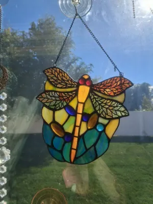 Sale Photo Thumbnail #374: LOT INCLUDES STAINED GLASS DRAGONFLY SUN CATCHER AND CRYSTAL PRISM WINDOW HANGING CHIME. GOOD CONDITION AND MORE.