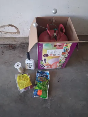 Sale Photo Thumbnail #177: BALLOON TIME HELIUM TANK, ACE MINI GLUE GUN, GLUE STICKS, ZURU BUNCH O BALLOONS, HELLO KITTY ITEMS, CRAFT STICKERS, AND MORE.