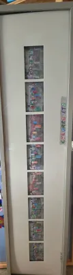 Sale Photo Thumbnail #45: Framed contemporary artwork featuring eight small, stacked mixed-media panels in a vertical multi-opening mat board.
