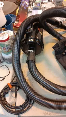 Sale Photo Thumbnail #23: MetroVac Air Force Blaster motorcycle dryer and blower unit with attached flexible hose and power cord.
