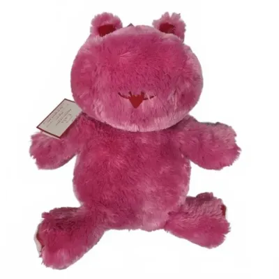 Hot Hugs plush pink frog heating pad toy with attached tag, featuring a microwavable insert and soft faux fur.