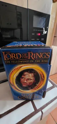 Sale Photo Thumbnail #19: Vintage 2001 Lord of the Rings: The Fellowship of the Ring Strider glass goblet in its original Burger King promotional box.