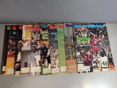 Sale Photo Thumbnail #292: Collection of vintage Sports Illustrated magazines from the late 1970s to early 1980s, featuring Julius Erving on the top cover.