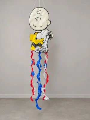 Sale Photo Thumbnail #207: Vintage Peanuts Charlie Brown and Snoopy hanging windsock featuring colorful patriotic red, white, and blue streamers.