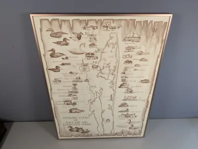 Sale Photo Thumbnail #17: Framed vintage pictorial map print titled 'Gunning Clubs of Back Bay and Currituck Sound' featuring illustrations of waterfowl and regional shooting lodges.