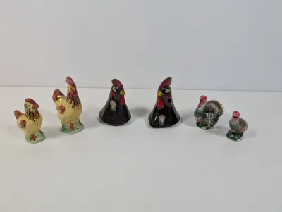 Sale Photo Thumbnail #89: Collection of six vintage ceramic bird novelty salt and pepper shakers, featuring roosters, hens, and turkeys.