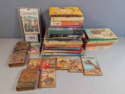 Sale Photo Thumbnail #276: Large collection of vintage children's books, Golden Guides, and storybooks, featuring titles such as 'Harry Potter and the Goblet of Fire' and 'Bambi's Children'.