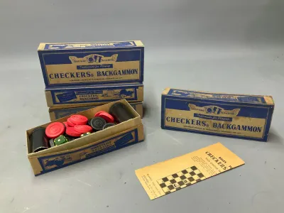 Sale Photo Thumbnail #350: Vintage Transogram Gold Medal checkers and backgammon sets, including boxed game pieces, dice cups, and original rule insert.