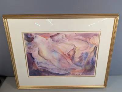 Sale Photo Thumbnail #16: Abstract watercolor painting featuring soft pastel tones of pink, purple, and yellow, presented in a matted gold-finished frame.