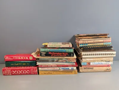 Sale Photo Thumbnail #280: Collection of vintage cookbooks and recipe booklets, including Betty Crocker's Picture Cook Book and The Settlement Cookbook.