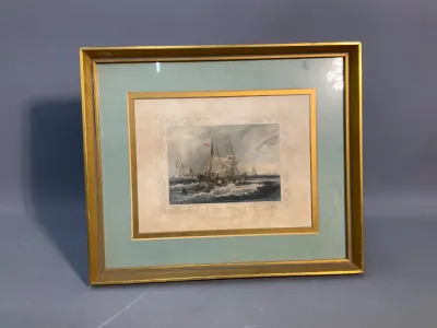Sale Photo Thumbnail #137: Framed antique maritime engraving featuring sailing ships in choppy waters, set in a double-matted gilt frame with a light green outer mat.