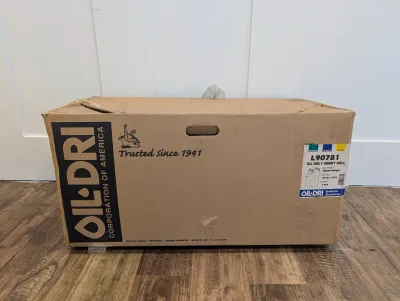 Sale Photo Thumbnail #472: Oil-Dri Corporation of America cardboard box containing an oil-only smart roll absorbent pad, model L90781.
