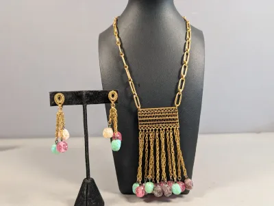 Sale Photo Thumbnail #399: Vintage gold-tone pendant necklace and matching dangle earrings featuring tassel chains tipped with colorful glass beads.