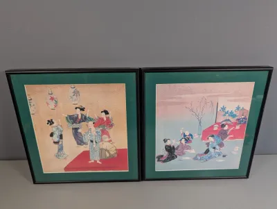Sale Photo Thumbnail #453: Pair of framed Japanese woodblock prints depicting traditional figures in colorful kimonos, styled with green matting and simple black metal frames.