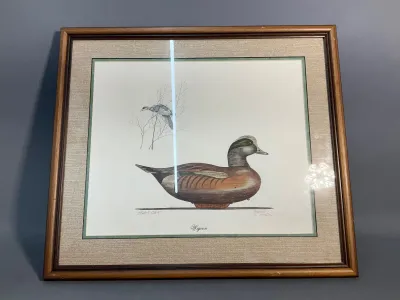 Sale Photo Thumbnail #79: Framed and matted wildlife art print titled "Wigeon" by Robert Clontz, housed in a molded wood frame with a linen mat.