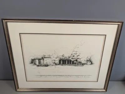 Sale Photo Thumbnail #439: Framed architectural ink sketch depicting a mid-century modern residence, presented in a double mat and metallic frame.