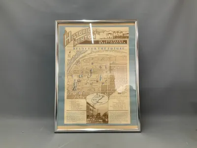 Sale Photo Thumbnail #152: Framed vintage map poster titled "Historic Hinton in Southern West Virginia," set behind glass in a sleek silver metal frame.