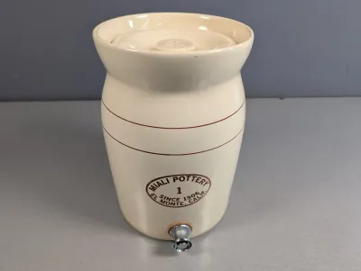 Sale Photo Thumbnail #31: Vintage Miali Pottery cream glaze 1-gallon ceramic water dispenser crock with lid and metal spigot, marked El Monte, Calif.