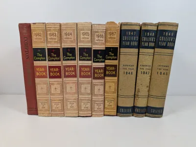Sale Photo Thumbnail #99: Collection of vintage hardbound yearbooks, including mid-century editions of The Compton Yearbook (1961–1967) and Collier's Year Book (1946–1948).