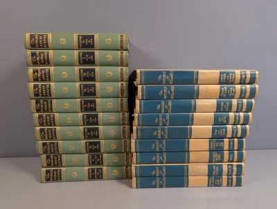 Sale Photo Thumbnail #268: Two stacked sets of vintage hardcover reference book collections, including 'The World's Great Events' and 'The Bookshelf for Boys and Girls'.
