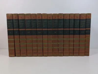 Sale Photo Thumbnail #95: Complete 15-volume set of vintage Compton's Pictured Encyclopedia bound in brown and green hardcovers.