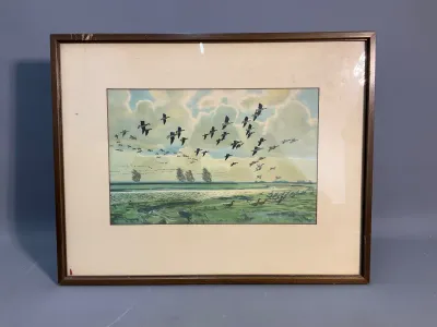 Sale Photo Thumbnail #146: Framed vintage art print depicting a flock of geese in flight over a wetland landscape, set in a matted wooden frame.