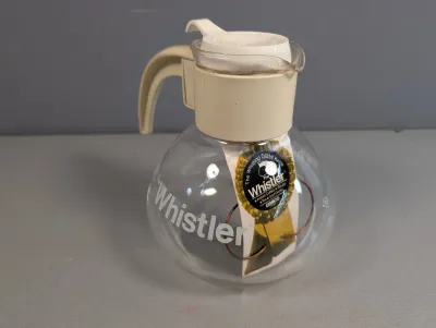 Sale Photo Thumbnail #386: Vintage Gemco 'The Whistler' glass kettle with cream-colored plastic handle and lid, complete with original product tag inside.