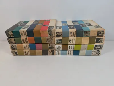 Sale Photo Thumbnail #97: Collection of eight vintage Encyclopedia Year Books published by Grolier, dating from 1967 to 1983.