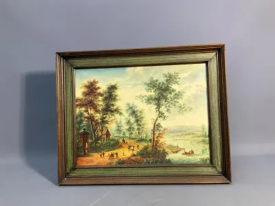 Sale Photo Thumbnail #144: Framed pastoral landscape art print featuring figures gathered along a riverbank, set in a molded wood frame with a green painted inner accent border.