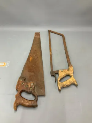 Sale Photo Thumbnail #342: Pair of vintage hand saws featuring a rusted handsaw and a metal frame bow saw, both with wooden handles.